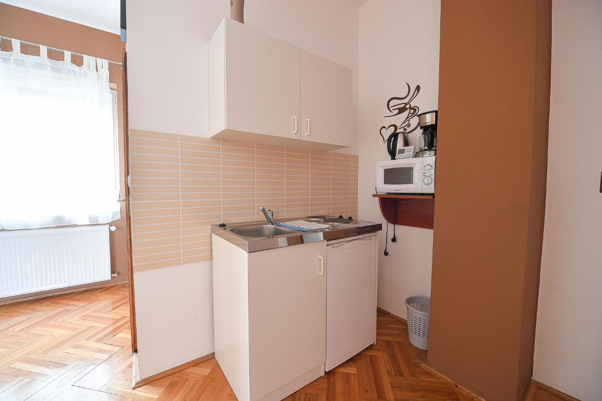 Kokusz Apartmanok Эгер Номер фото