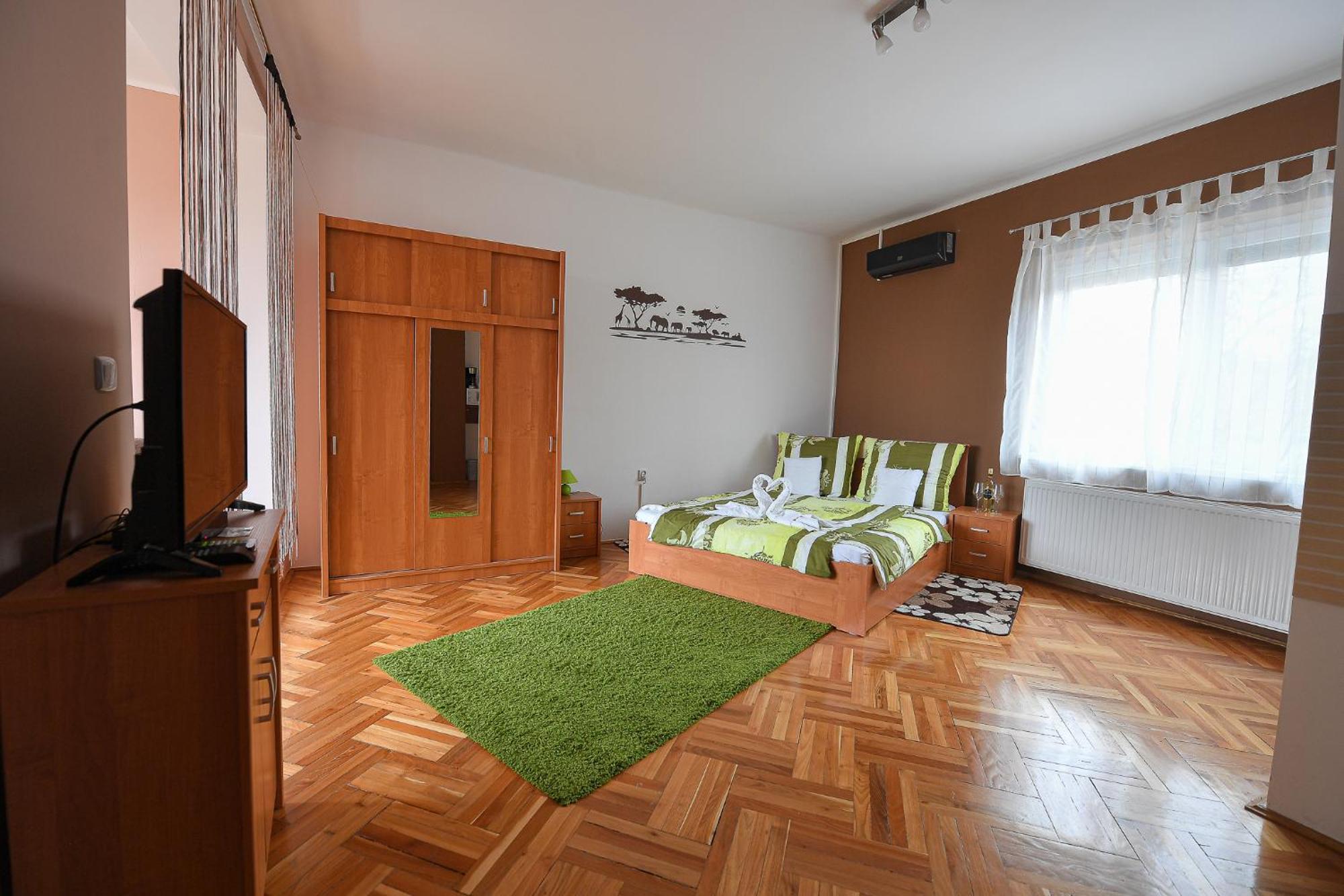 Kokusz Apartmanok Эгер Номер фото